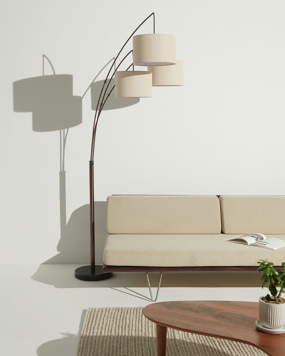 Glowmere Trilage Three Light Adjustable Arm Floor Lamp in bronze