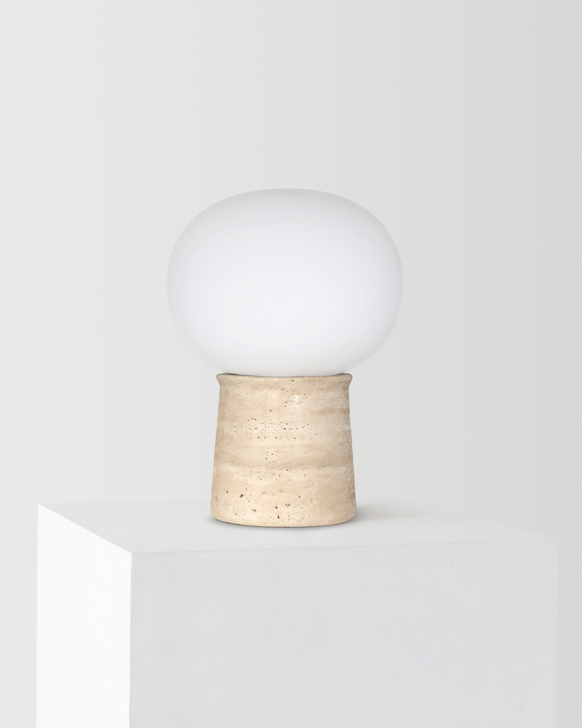 Glowmere Neptune Travertine Base Round Glass Shade Table Lamp view 2