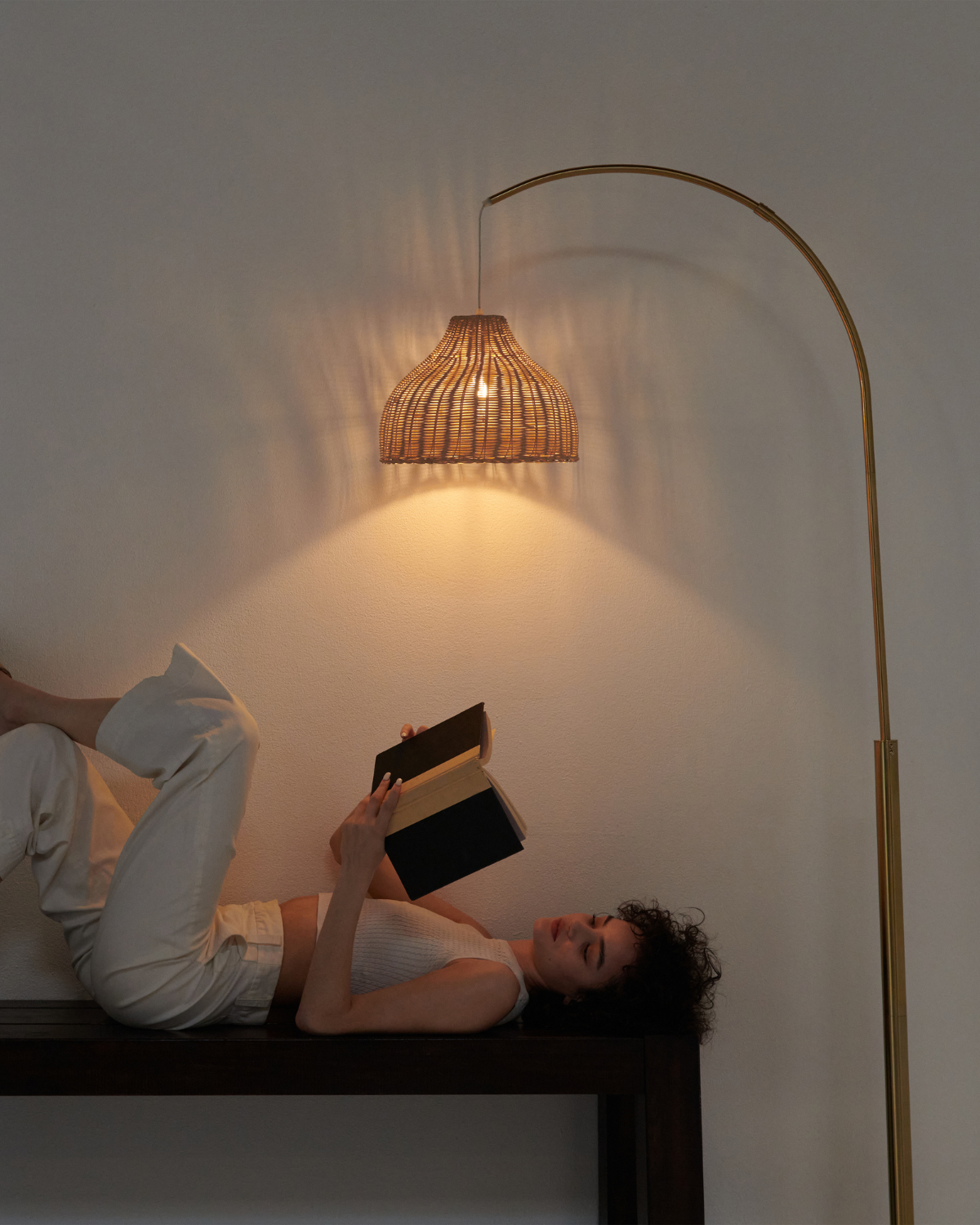 Glowmere Lark Arc Floor Lamp with Wicker Hanging Shade in brass