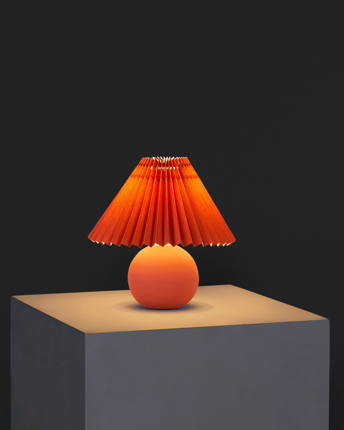 Glowmere Serena Ceramic Globe Base Table Lamp with Pleated Shade in red